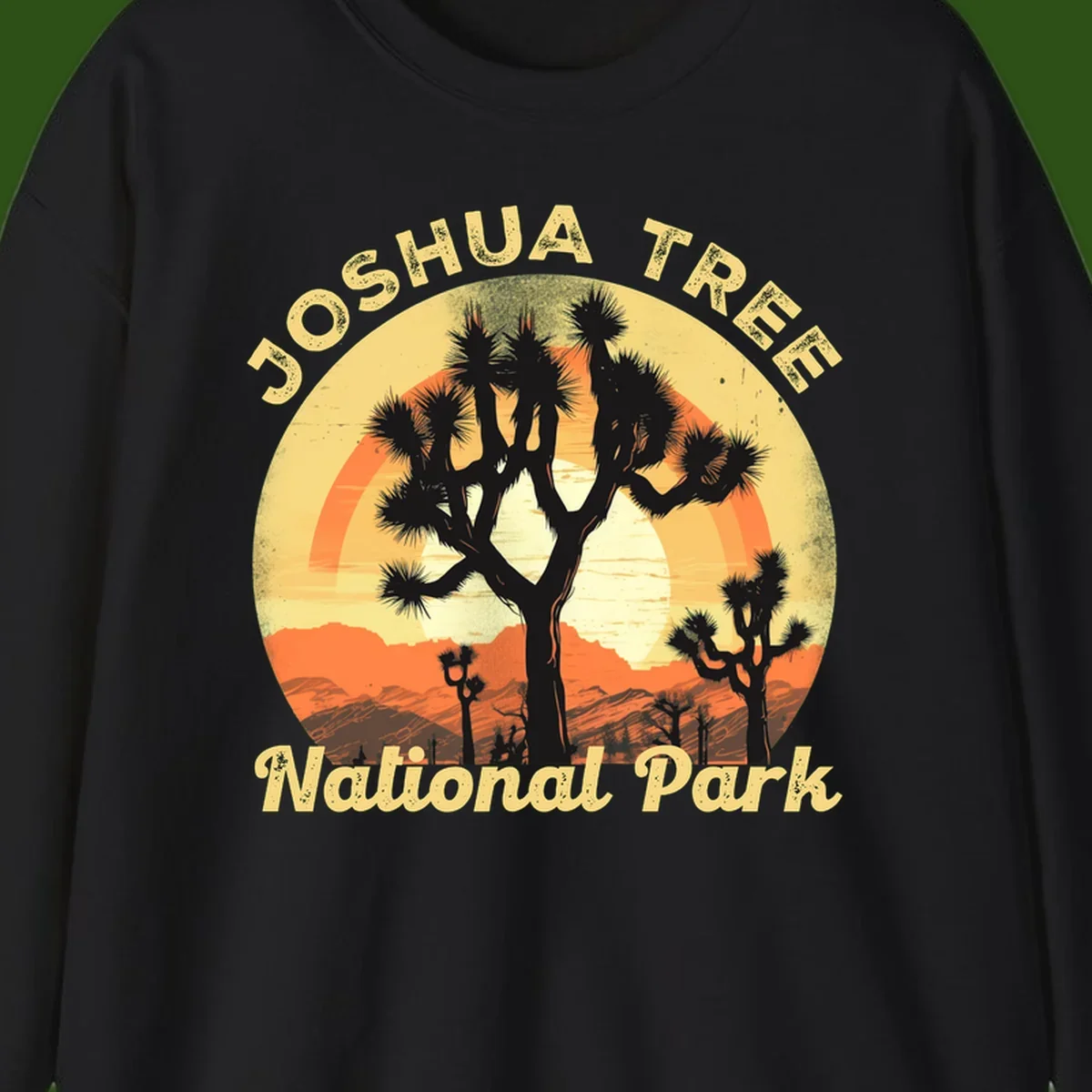 Vintage circular badge design featuring joshua tree desert sunset with silhouetted trees and warm gradient sky