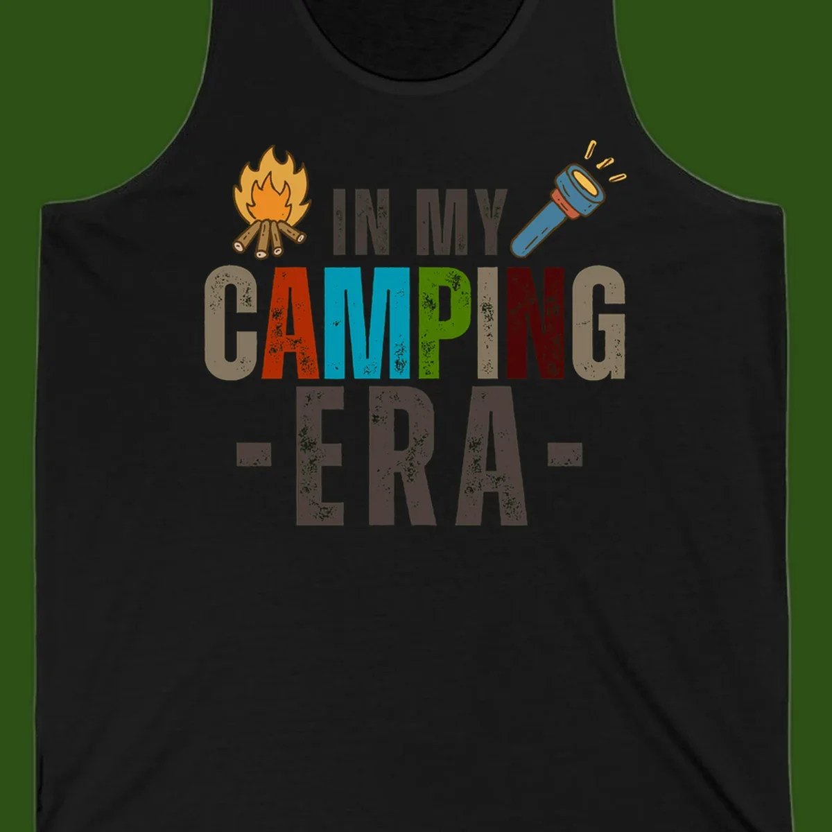 Campfire and flashlight icons flank colorful distressed text reading 'In My Camping Era' on gray background