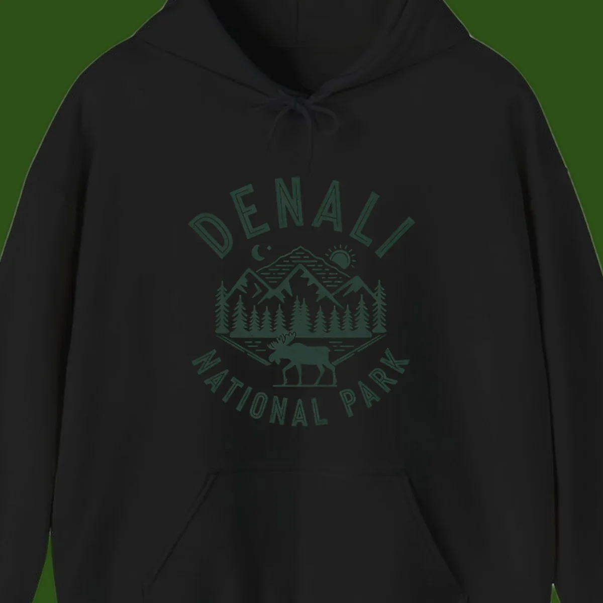 Denial National Park badge design with moose walking through forest, mountains, sun and moon with crossed fishing rods