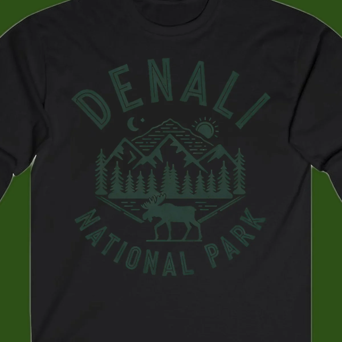 Denial National Park badge design with moose walking through forest, mountains, sun and moon with crossed fishing rods