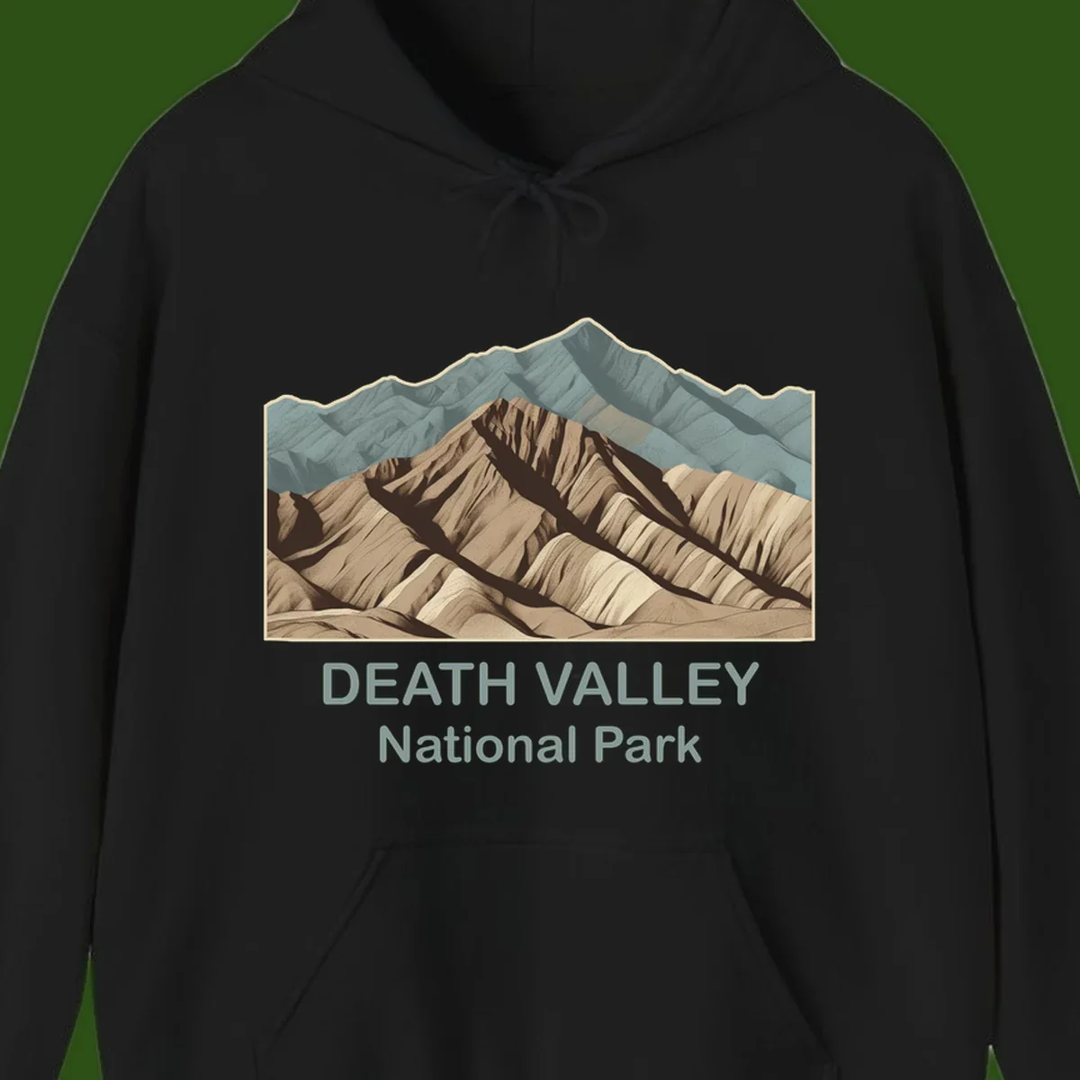 Vintage-style illustration of Death Valley badlands with layered tan and brown striped mountains, teal peaks in background, and text reading Death Valley National Park.