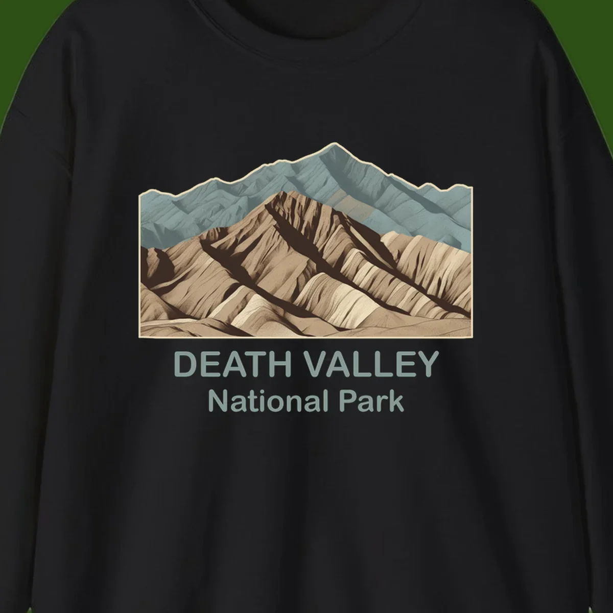 Vintage-style illustration of Death Valley badlands with layered tan and brown striped mountains, teal peaks in background, and text reading Death Valley National Park.