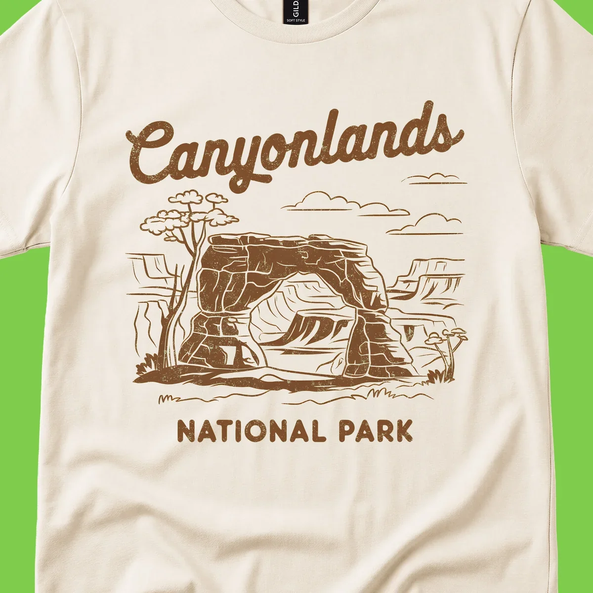 Vintage illustration of Canyonlands National Park featuring layered red rock canyon formations, desert acacia tree, and clouds in rust orange line art.