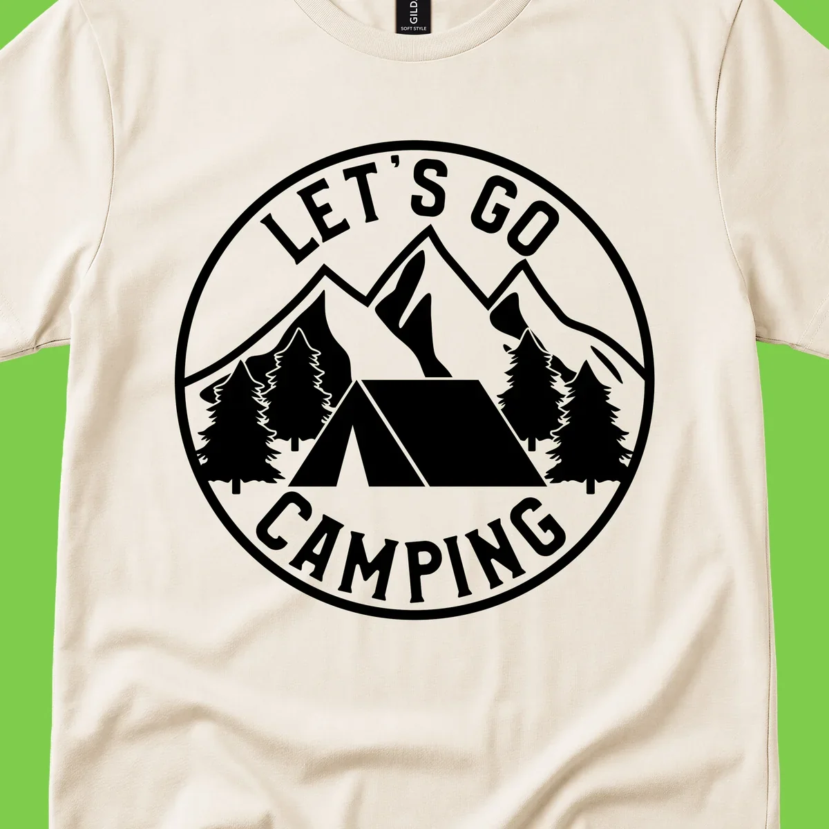 Circular let's go camping badge with tent, trees, and mountains in white and gray