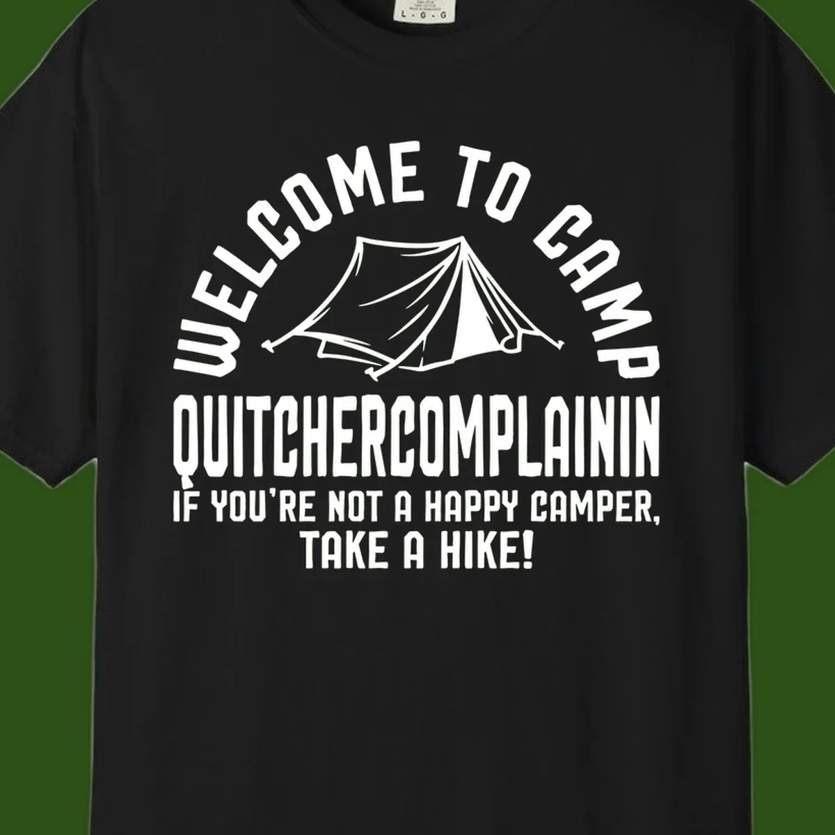 White tent illustration with curved text reading 'Welcome to Camp Quitcherecomplaining' and tagline 'If you're not a happy camper, take a hike' on gray background.