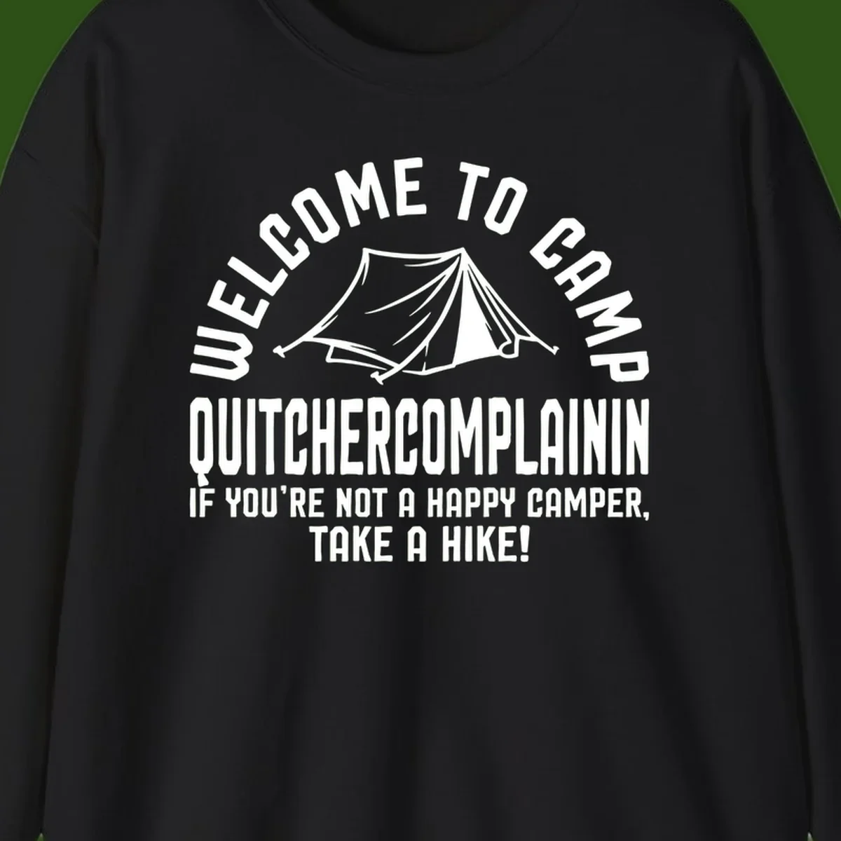 White tent illustration with curved text reading 'Welcome to Camp Quitcherecomplaining' and tagline 'If you're not a happy camper, take a hike' on gray background.