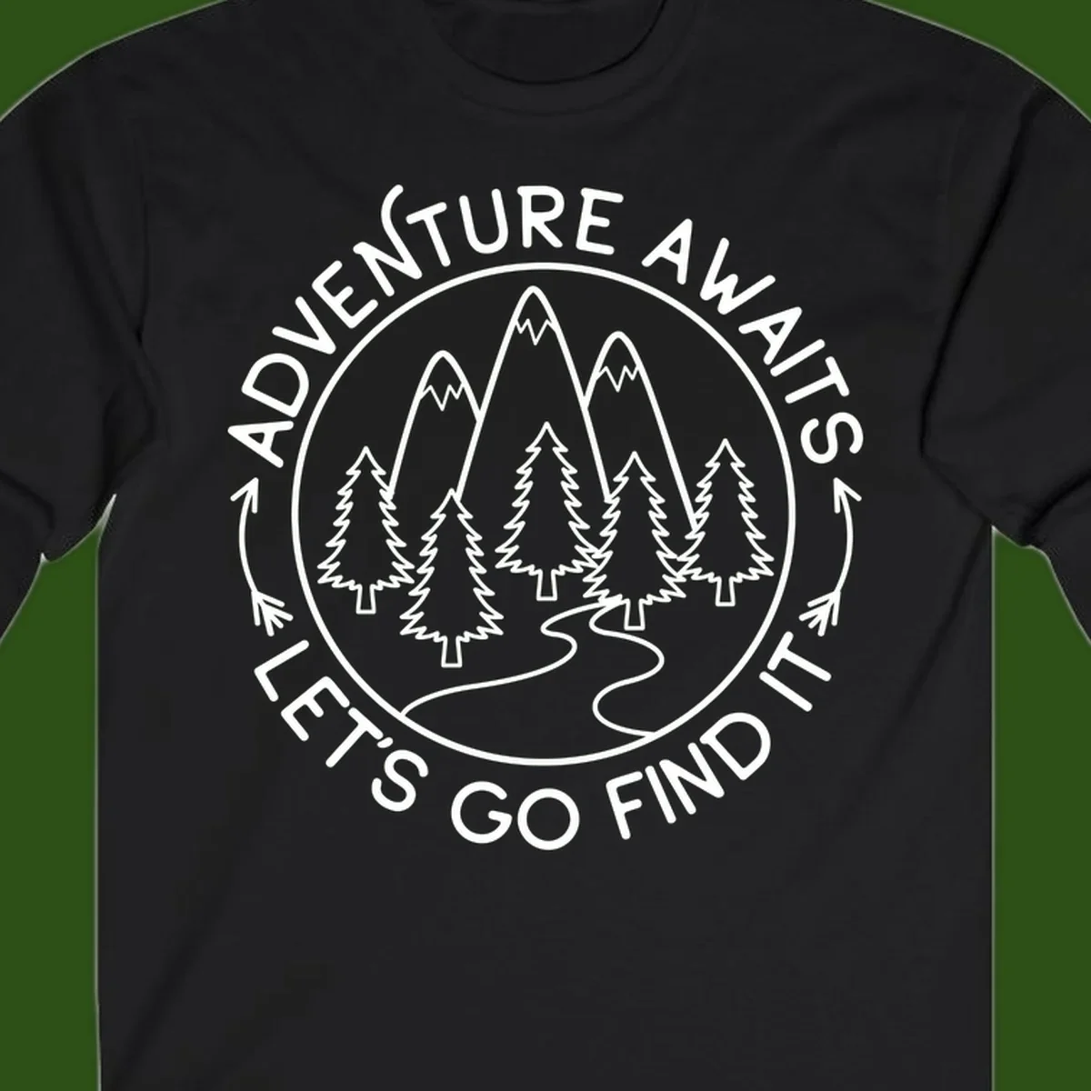 Circular badge with forest scene of evergreen trees and mountains, text reads 'Adventure Awaits Let's Go Find It'