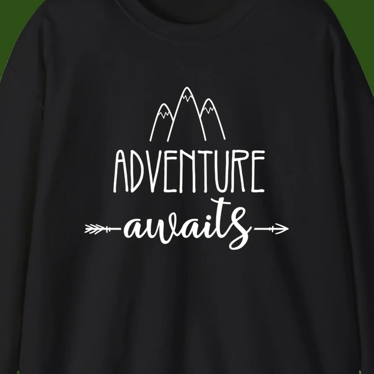 Adventure awaits mountains design with three snow-capped peaks and decorative arrows in white linework