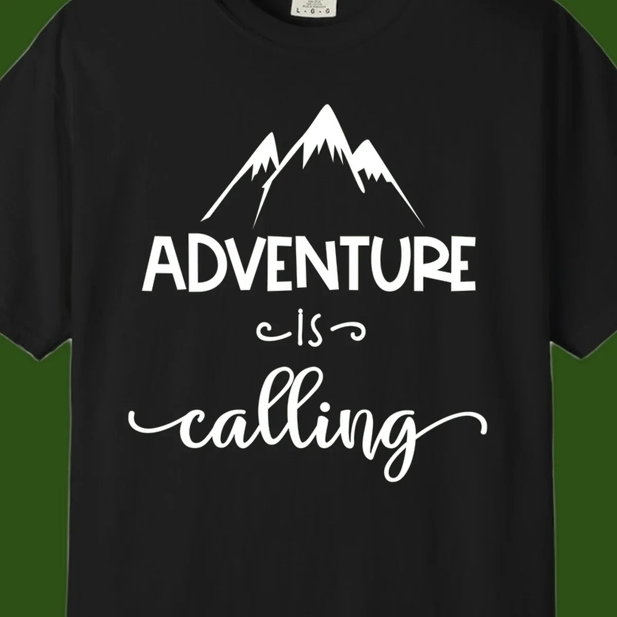 Adventure is calling design with three snow-capped mountain peaks and motivational text on gray background