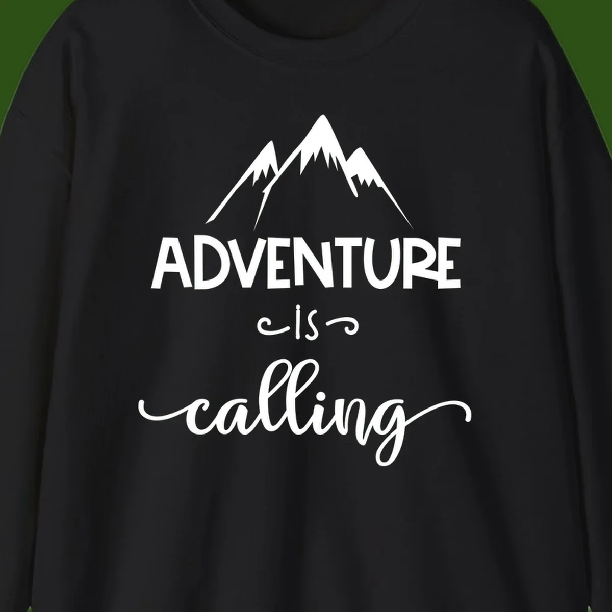 Adventure is calling design with three snow-capped mountain peaks and motivational text on gray background