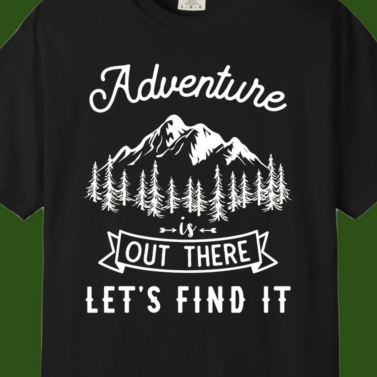 Adventure is out there design with snow mountains, pine forest, and text saying let's find it