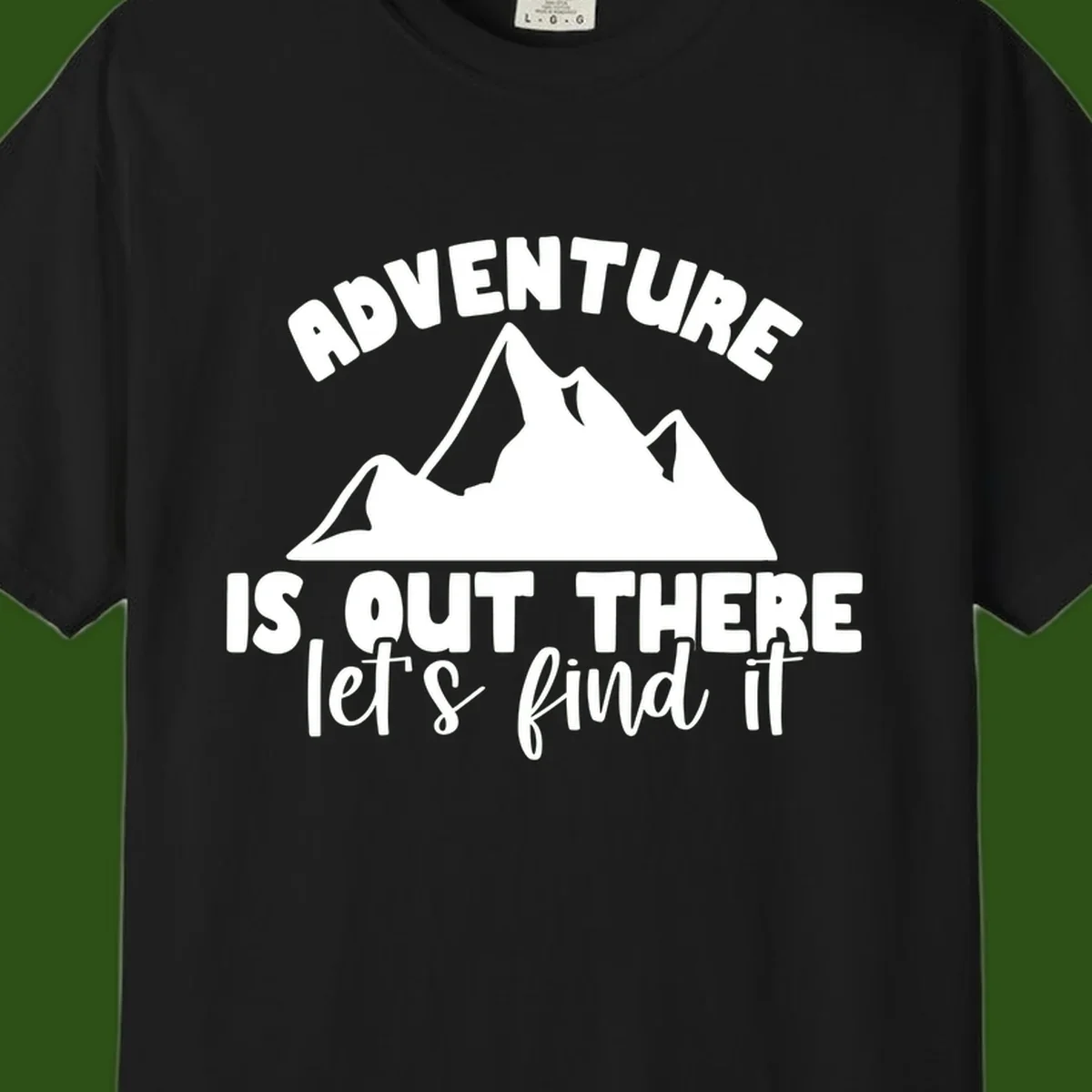 White jagged mountain silhouette with text 'Adventure Is, Out There let's find it' on gray background
