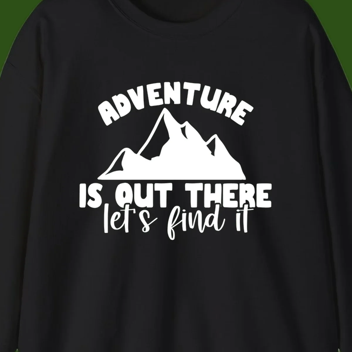 White jagged mountain silhouette with text 'Adventure Is, Out There let's find it' on gray background