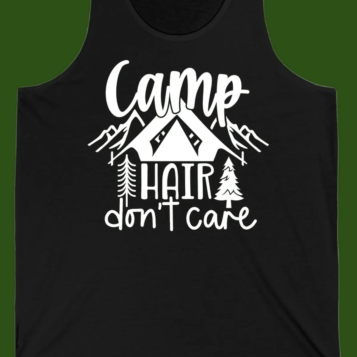 Camp hair don't care design with tent, mountains, pine trees, and campfire illustration with cursive text