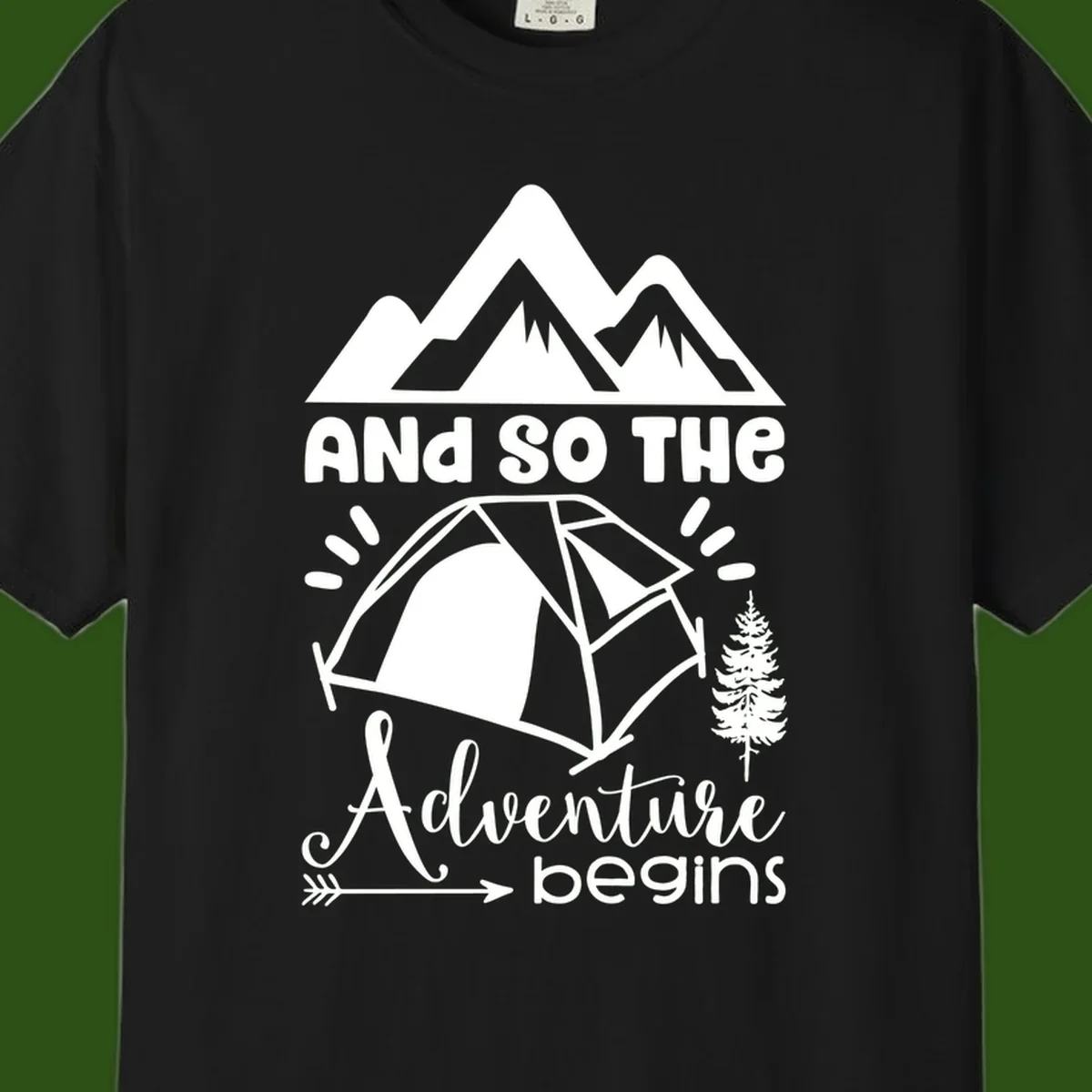 Adventure begins camping design with snow mountains, tent, tree, and motivational text on gray background