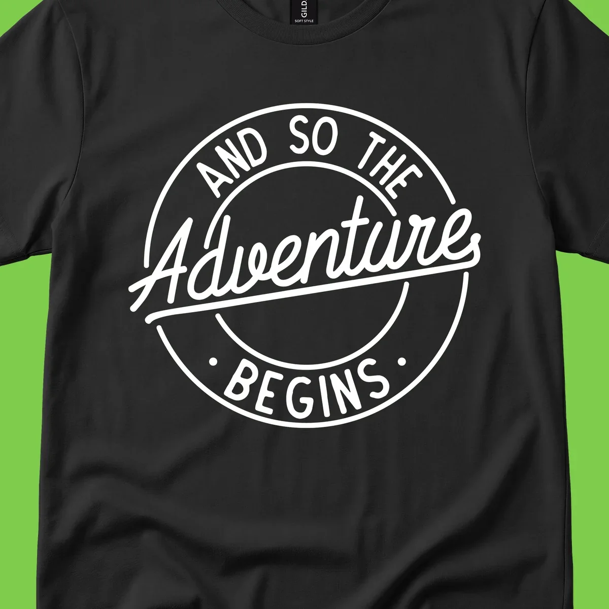 Vintage circular badge design with white text reading 'And So The Adventure Begins' on gray background