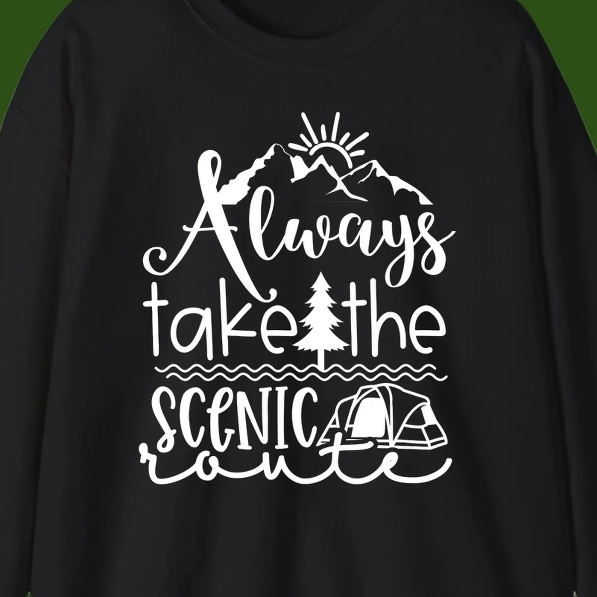 White line art design with mountains, sun, pine tree, tent, and water featuring 'Always take the scenic route' script text