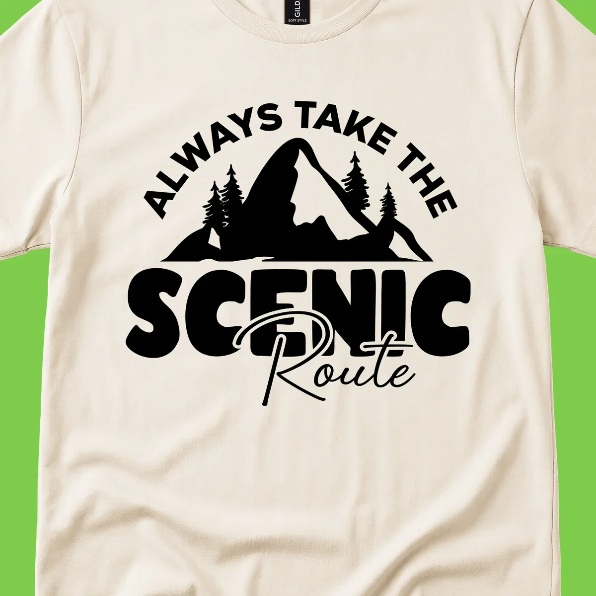 White mountain landscape illustration with evergreen trees and text reading 'All Ways Take The Scenic Route' on gray background