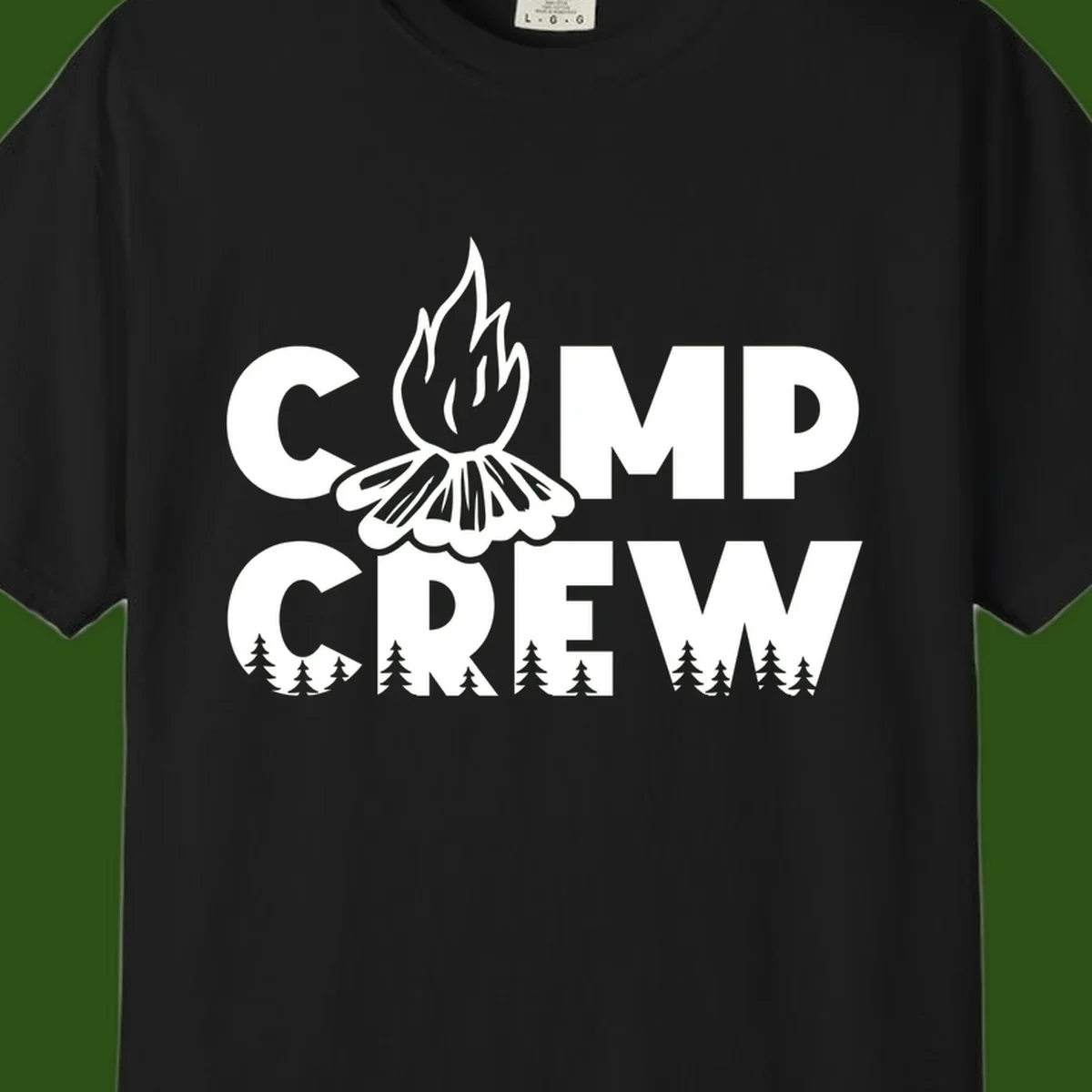 Camp Crew campfire design with stylized flames, flower bloom, and pine trees on gray background