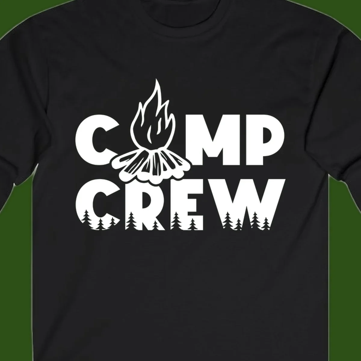 Camp Crew campfire design with stylized flames, flower bloom, and pine trees on gray background
