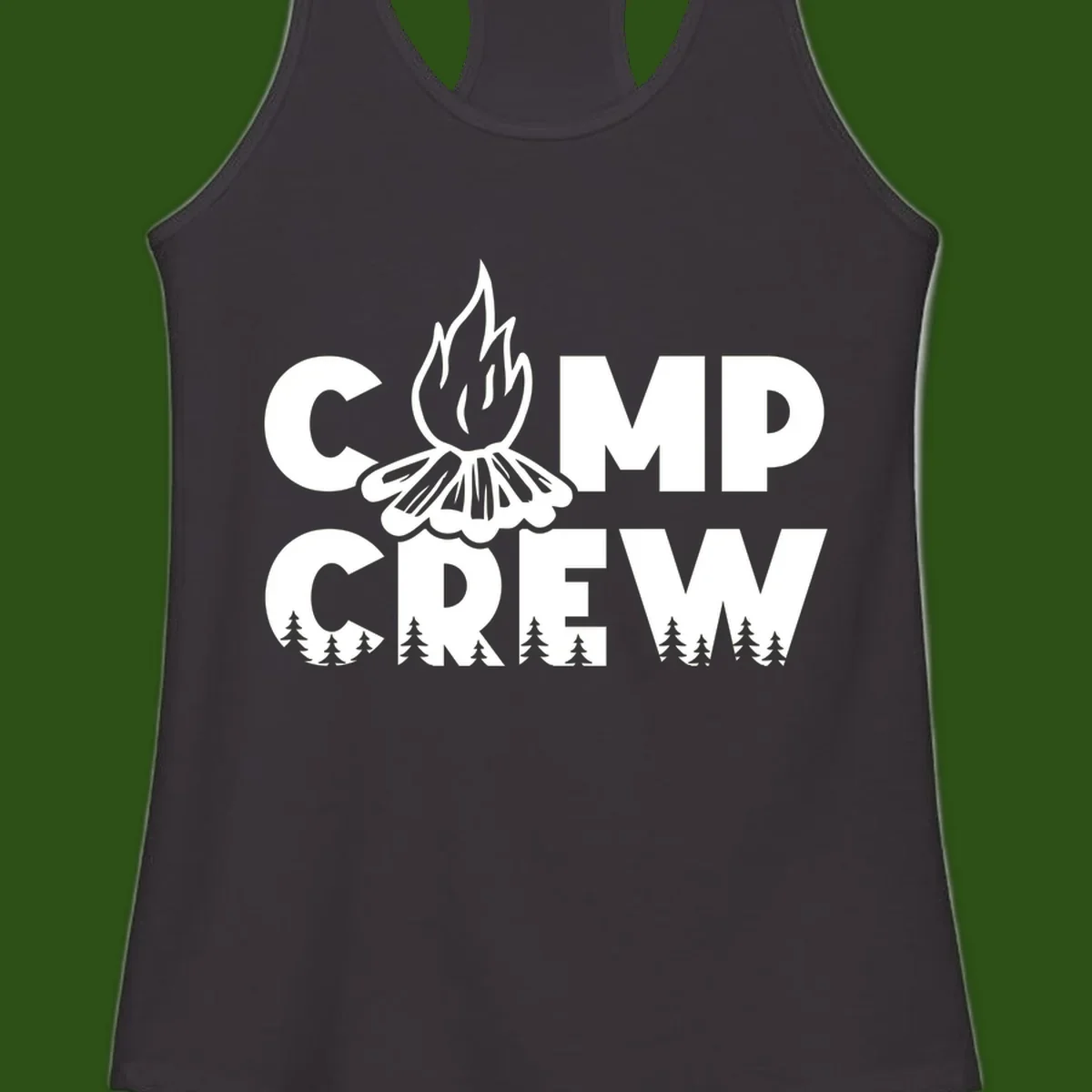 Camp Crew campfire design with stylized flames, flower bloom, and pine trees on gray background