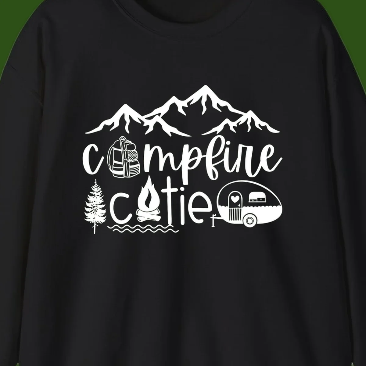 Campfire cutie camping design with mountains, backpack, camper trailer, campfire, and pine tree in white on gray background