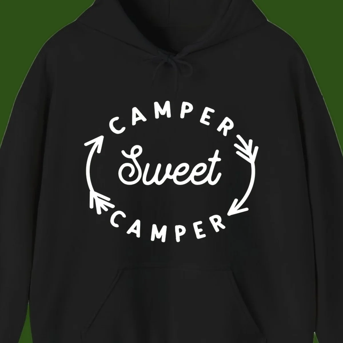 Circular badge design with 'Camper Sweet Camper' text and pine branch decorations in white on gray background