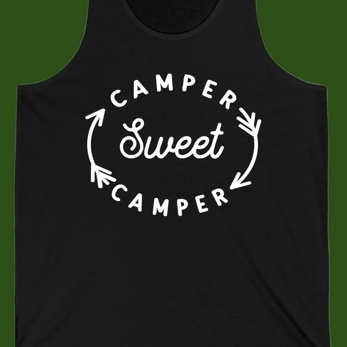 Circular badge design with 'Camper Sweet Camper' text and pine branch decorations in white on gray background