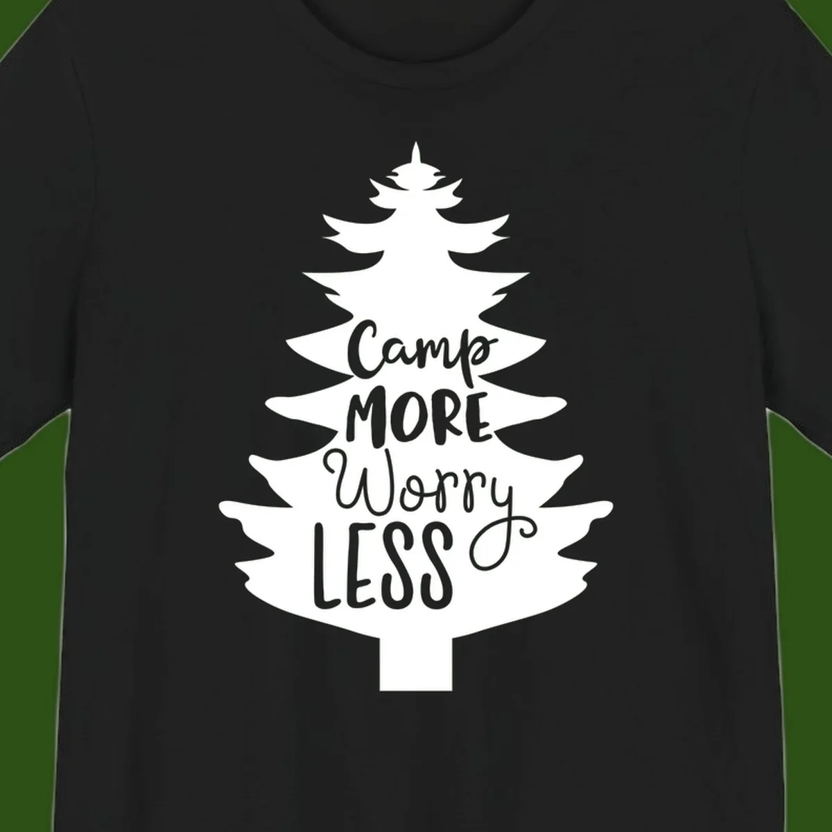 White evergreen tree silhouette with text reading 'Camp MORE Worry LESS' centered in the branches on gray background