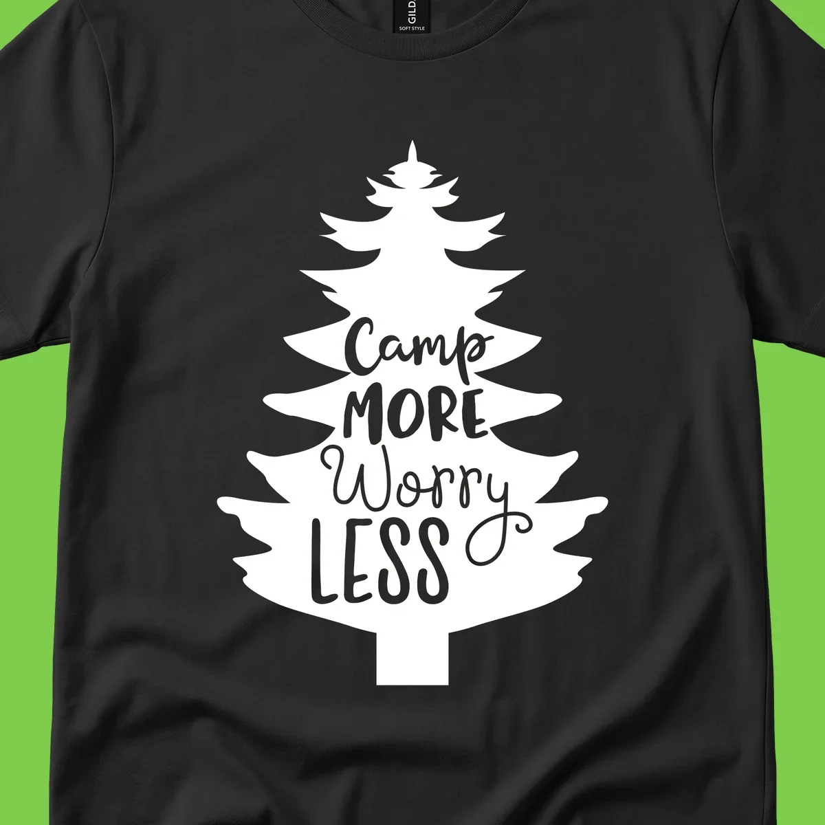 White evergreen tree silhouette with text reading 'Camp MORE Worry LESS' centered in the branches on gray background