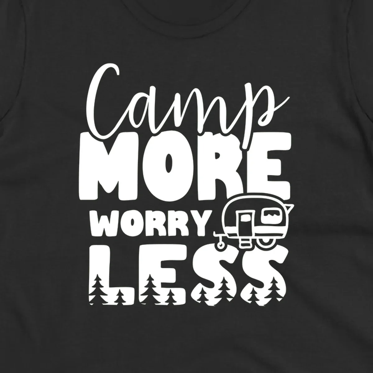 Camp More Worry Less design with flowing script text, camping trailer, and pine trees on gray background
