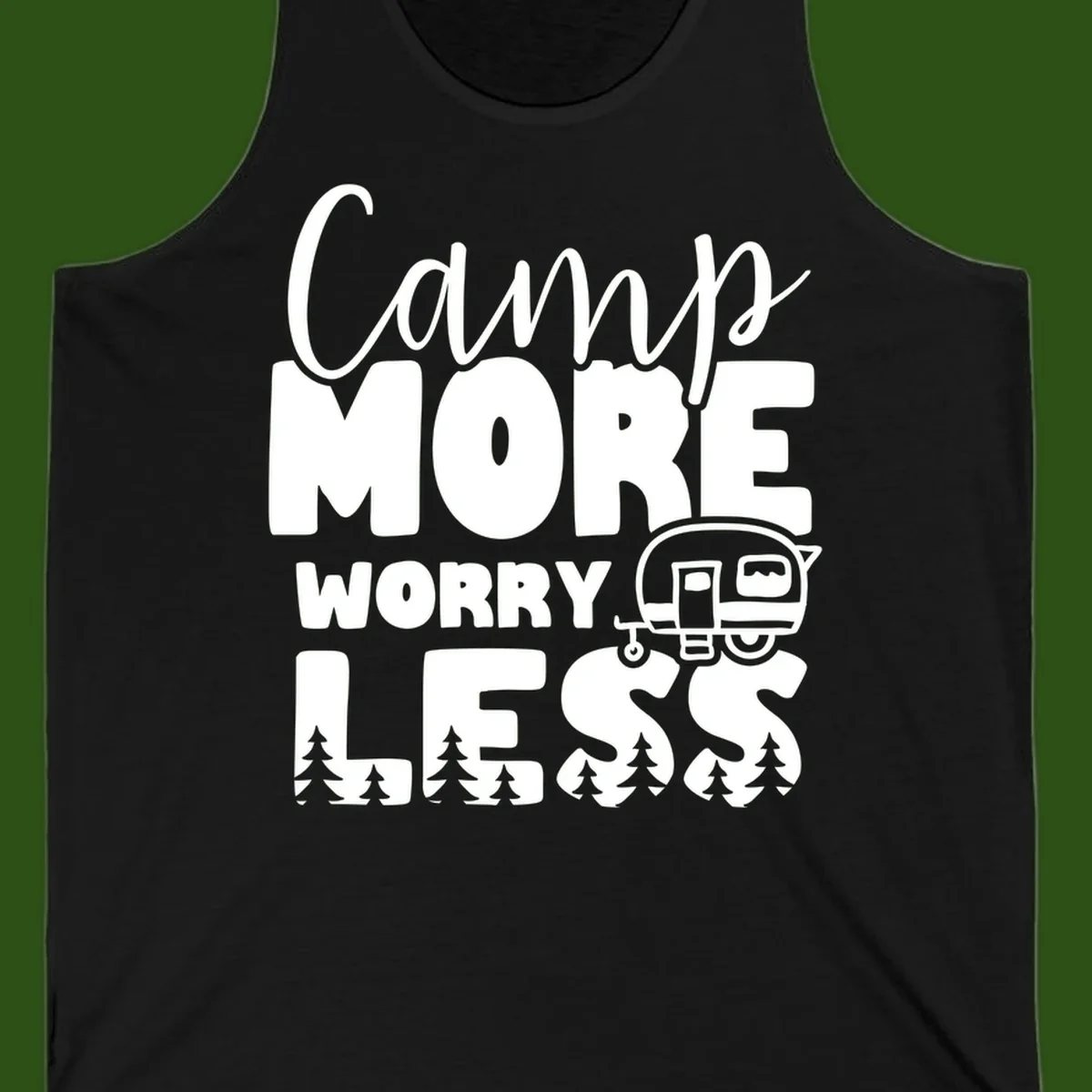 Camp More Worry Less design with flowing script text, camping trailer, and pine trees on gray background