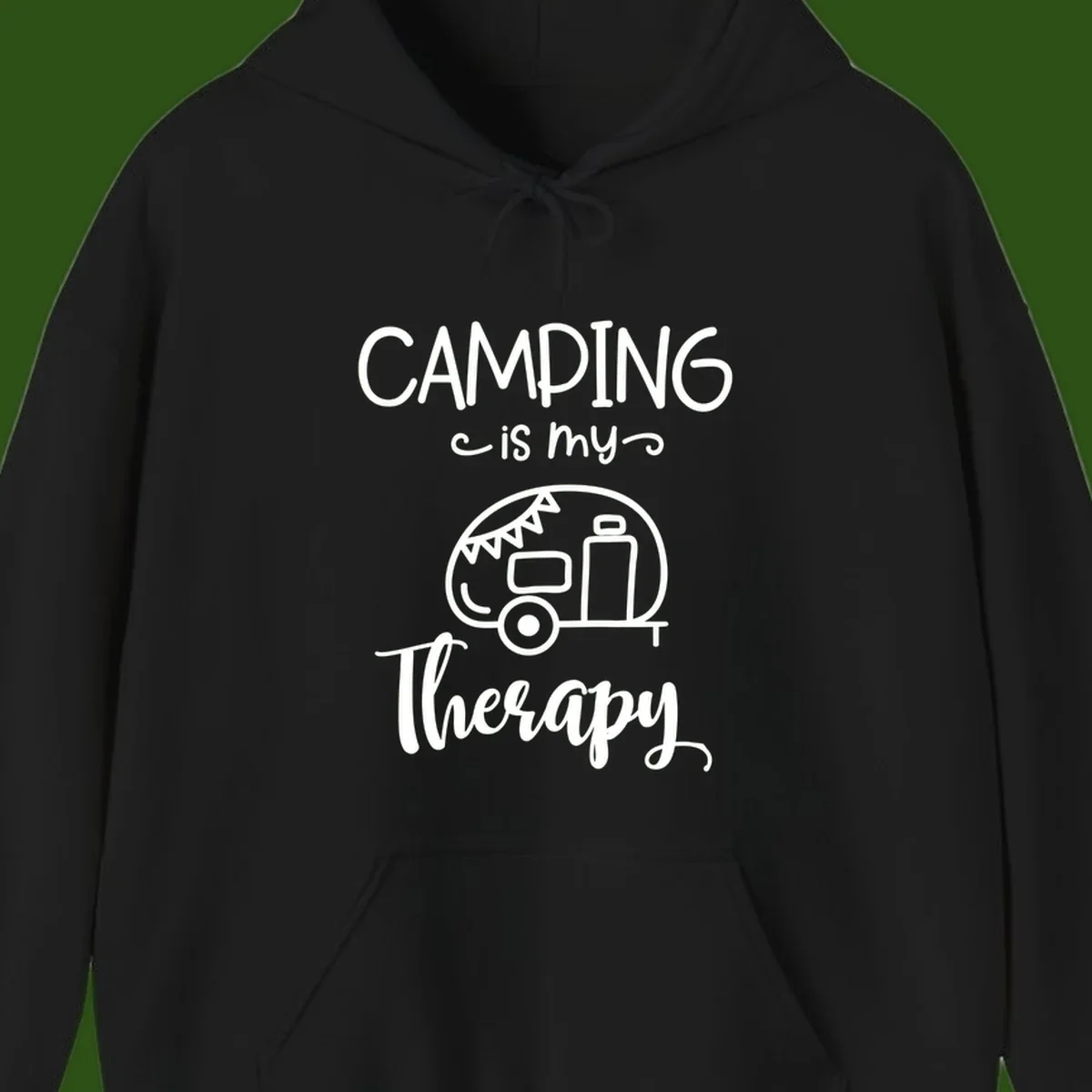 White line drawing of vintage travel trailer with bunting and text reading 'Camping is my Therapy' on gray background