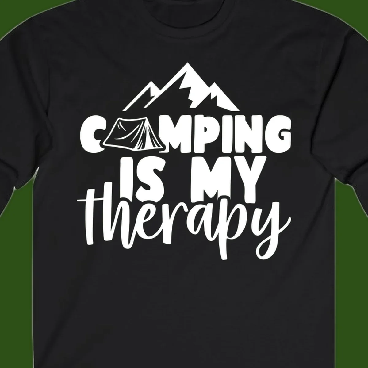 White text reading 'Camping Is My Therapy' with tent and mountain graphic design on gray background