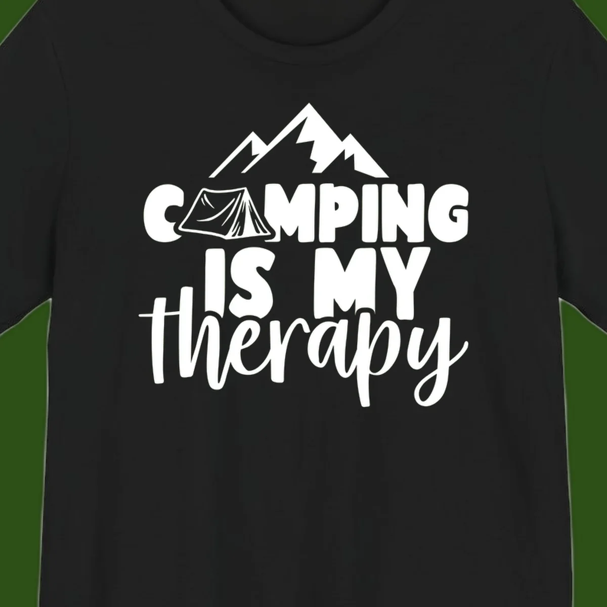 White text reading 'Camping Is My Therapy' with tent and mountain graphic design on gray background