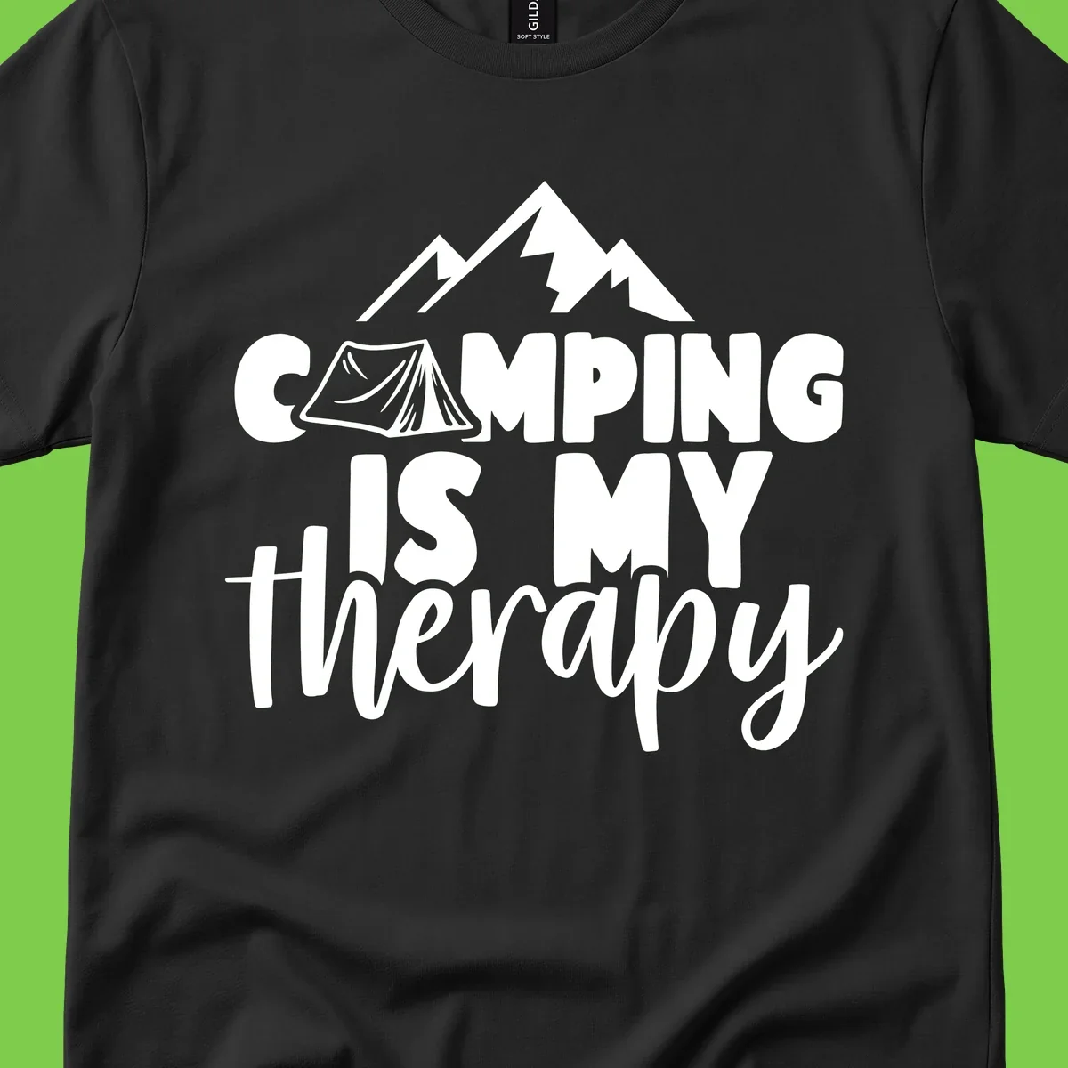 White text reading 'Camping Is My Therapy' with tent and mountain graphic design on gray background