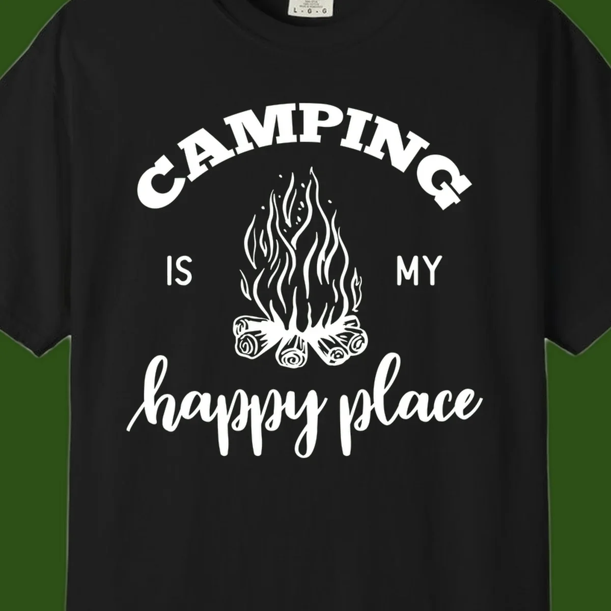 White campfire illustration with text reading 'Camping Is My Happy Place' on gray background