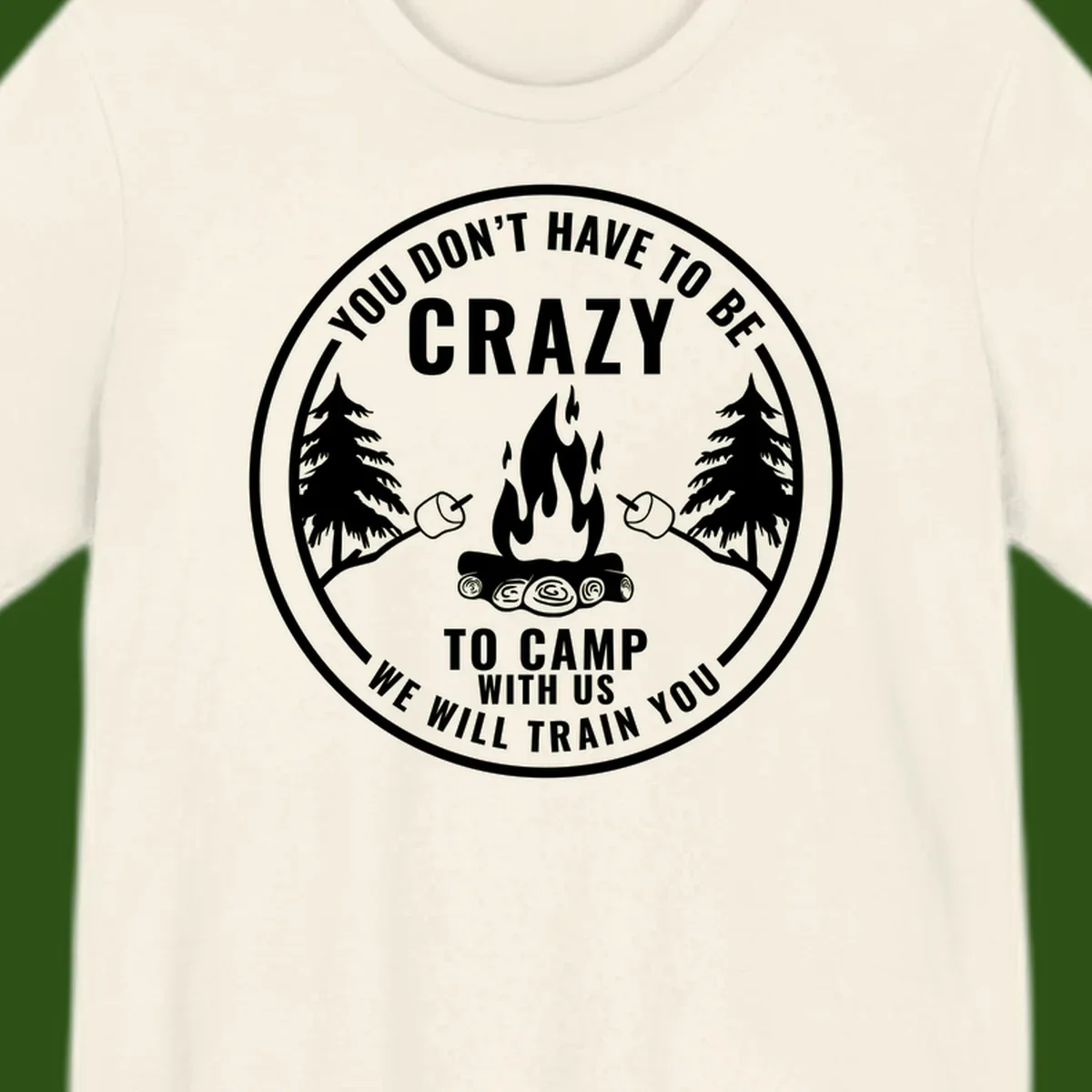 Circular badge design with campfire, pine trees, and marshmallows on sticks with humorous camping text about training crazy campers