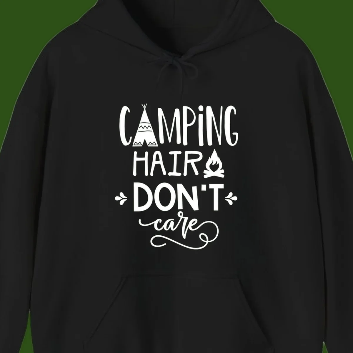 Camping hair don't care design with teepee, campfire, and decorative leaves on gray background