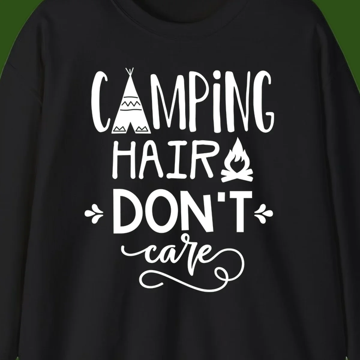 Camping hair don't care design with teepee, campfire, and decorative leaves on gray background