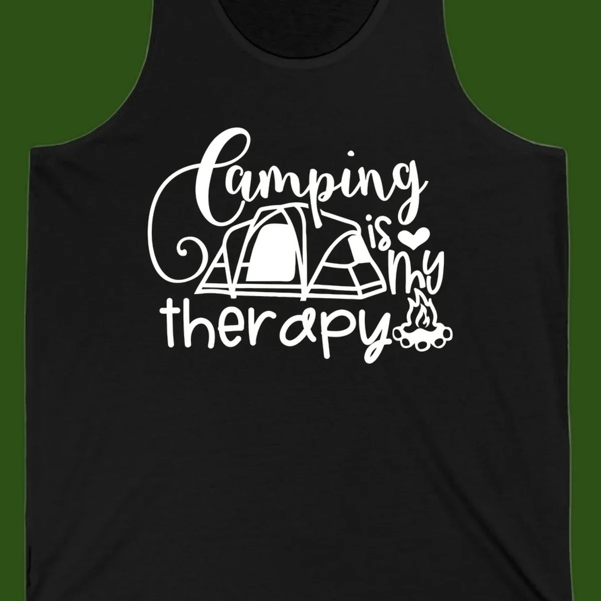 White lettered design reading 'Camping is Therapy' with heart symbol, tent, and campfire illustration on gray background