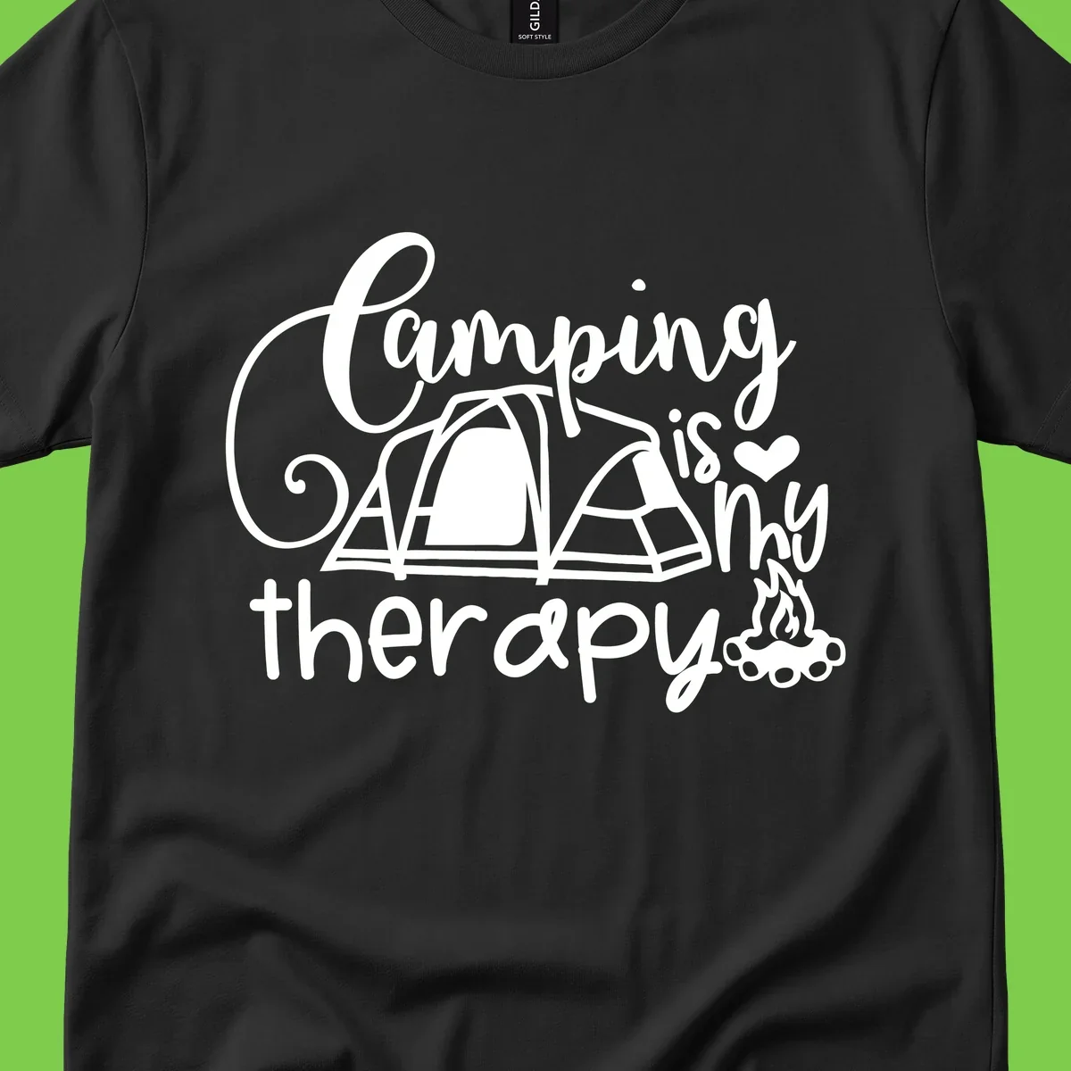 White lettered design reading 'Camping is Therapy' with heart symbol, tent, and campfire illustration on gray background