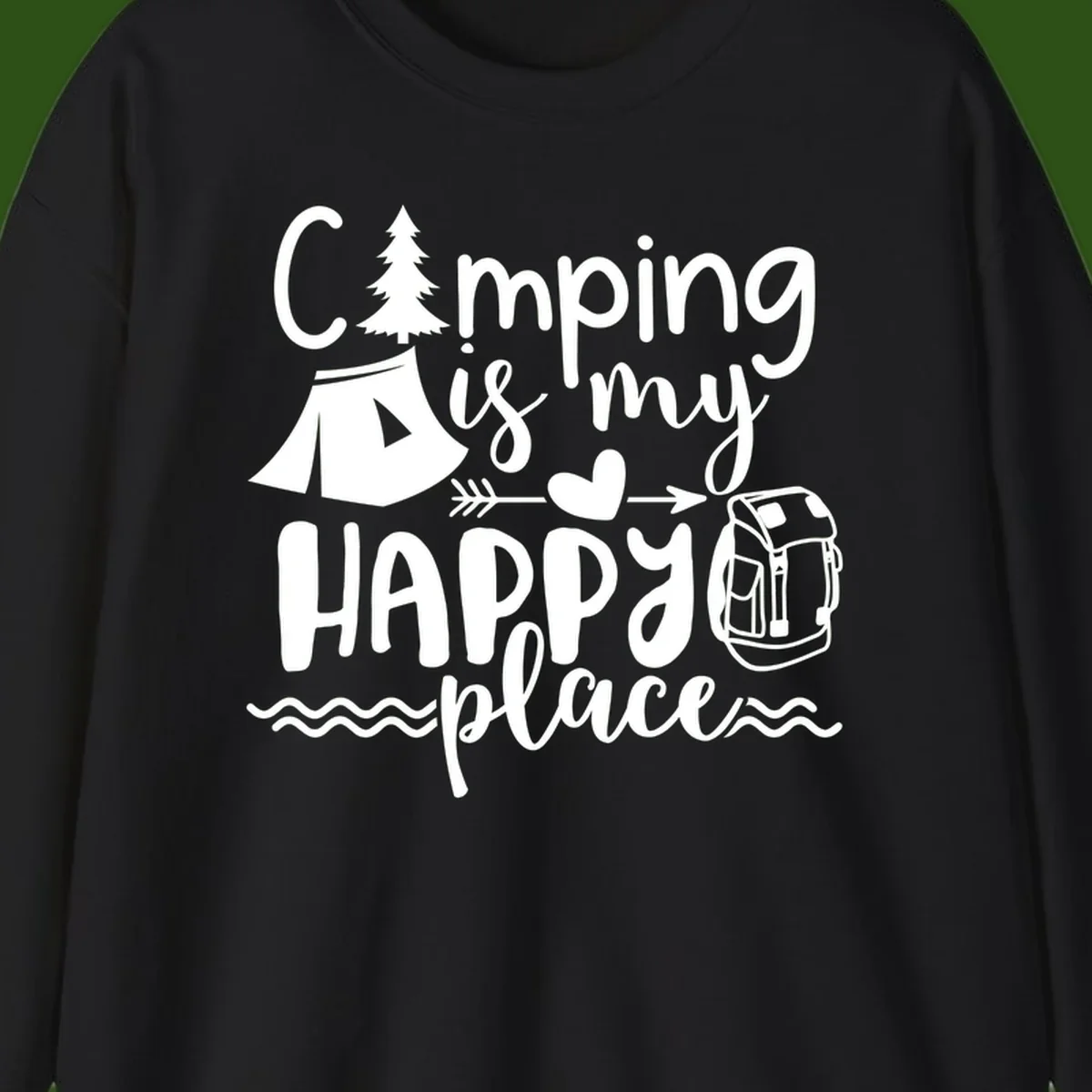 White illustrated camping design with text 'Camping is my happy place' featuring tent, pine tree, beer mug, and backpack on gray background