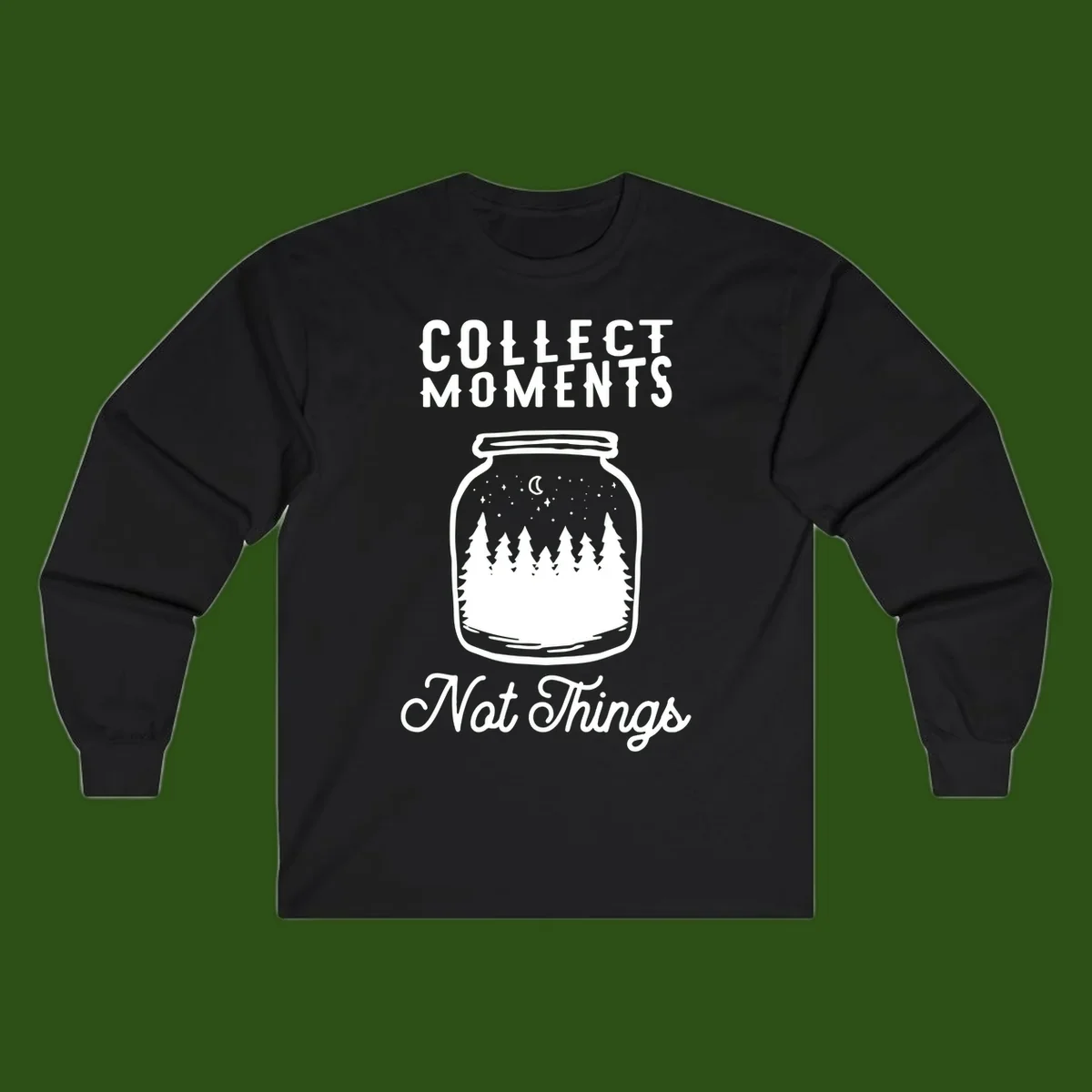 White illustrated mason jar filled with evergreen forest, moon, and stars with text 'Collect Moments Not Things' for camping enthusiasts