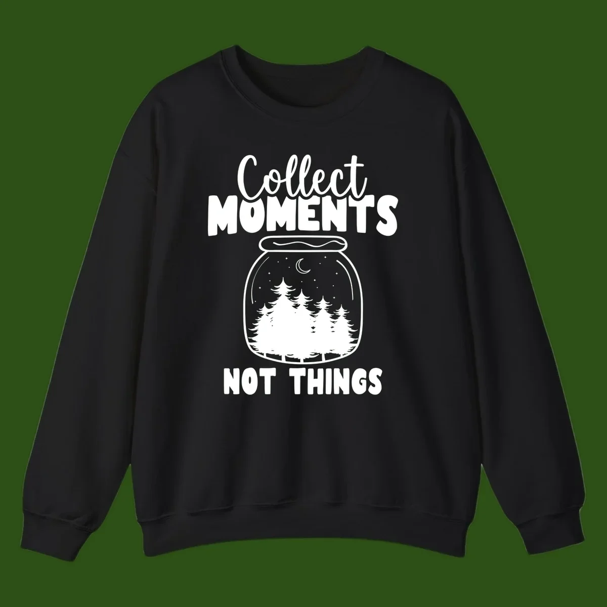 Illustration of a mason jar containing a nighttime forest scene with trees, moon, and stars, with text reading 'Collect Moments Not Things'