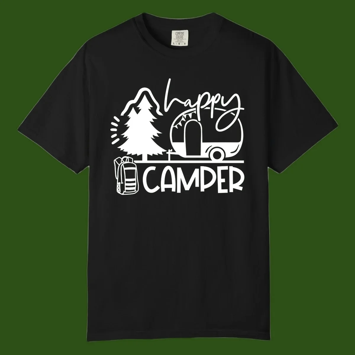 Happy Camper design with evergreen tree, vintage teardrop trailer, backpack, and radiating light rays in white on gray background.