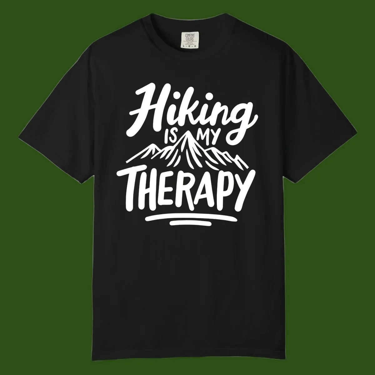 White text reading 'Hiking is MY THERAPY' with illustrated mountain range, on gray background