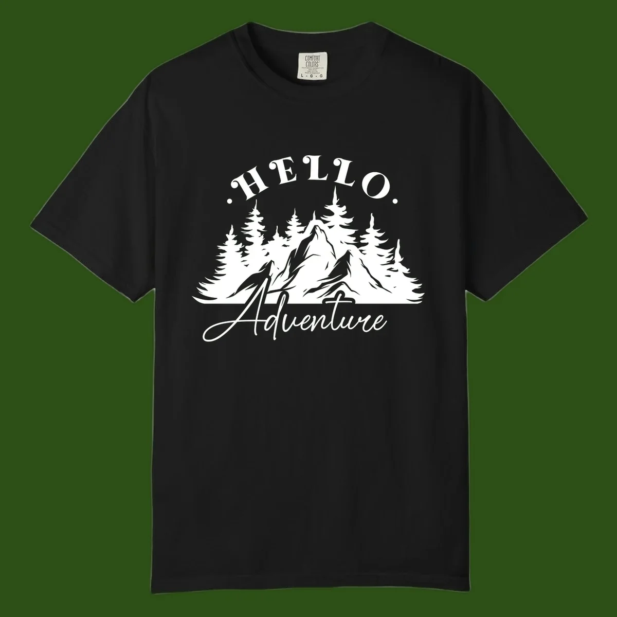 Hello adventure mountain design featuring snow-capped peak and evergreen forest silhouette in white and gray