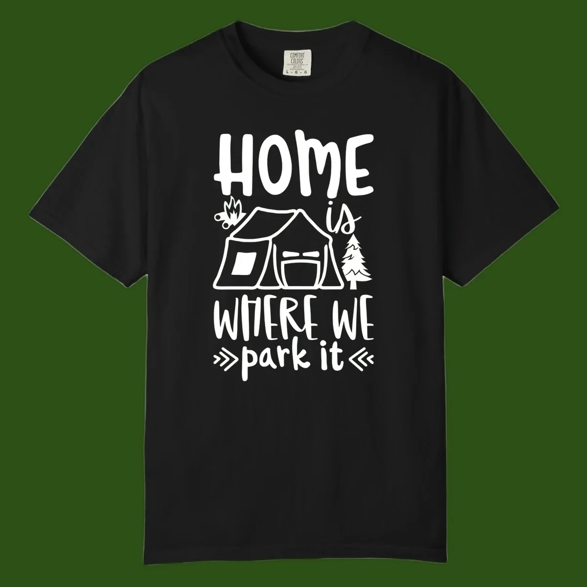 Home is where we park it camping design with tent, campfire, and evergreen tree illustration