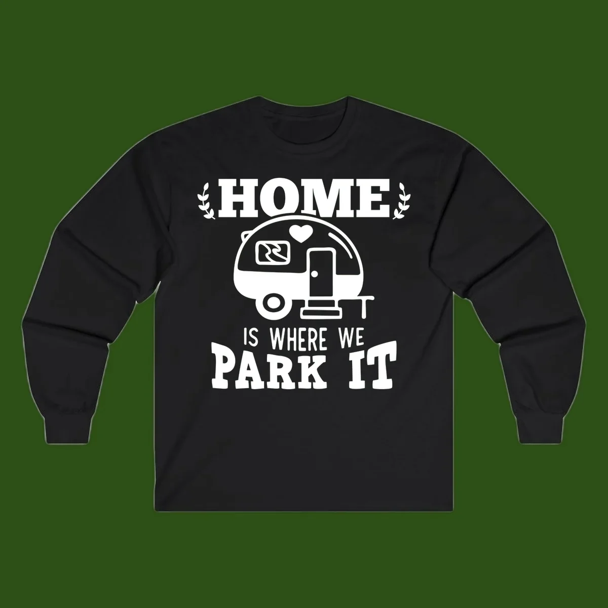 Vintage travel trailer illustration with 'Home Is Where We Park It' text and laurel wreaths on gray background